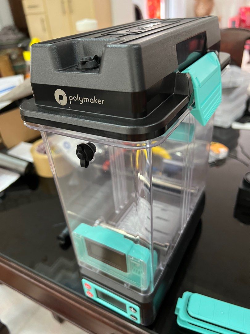 Polymaker PolyDryer (Category: Printers, Scanners & Copiers) located in Singapore. Submitted by reify3d (Listing ID 1311382204, Image 2). Description: Brand new in box Polymaker PolyDryer for sale. Photos are my demo unit to show what it looks like. Items: • PolyDryer heating unit • 100-240V power supply, EU style 2-pin plug • Desiccant • Instruction manual • PTFE tube • Injection molded holder (for cardboard spools) • Humidity level LCD display 