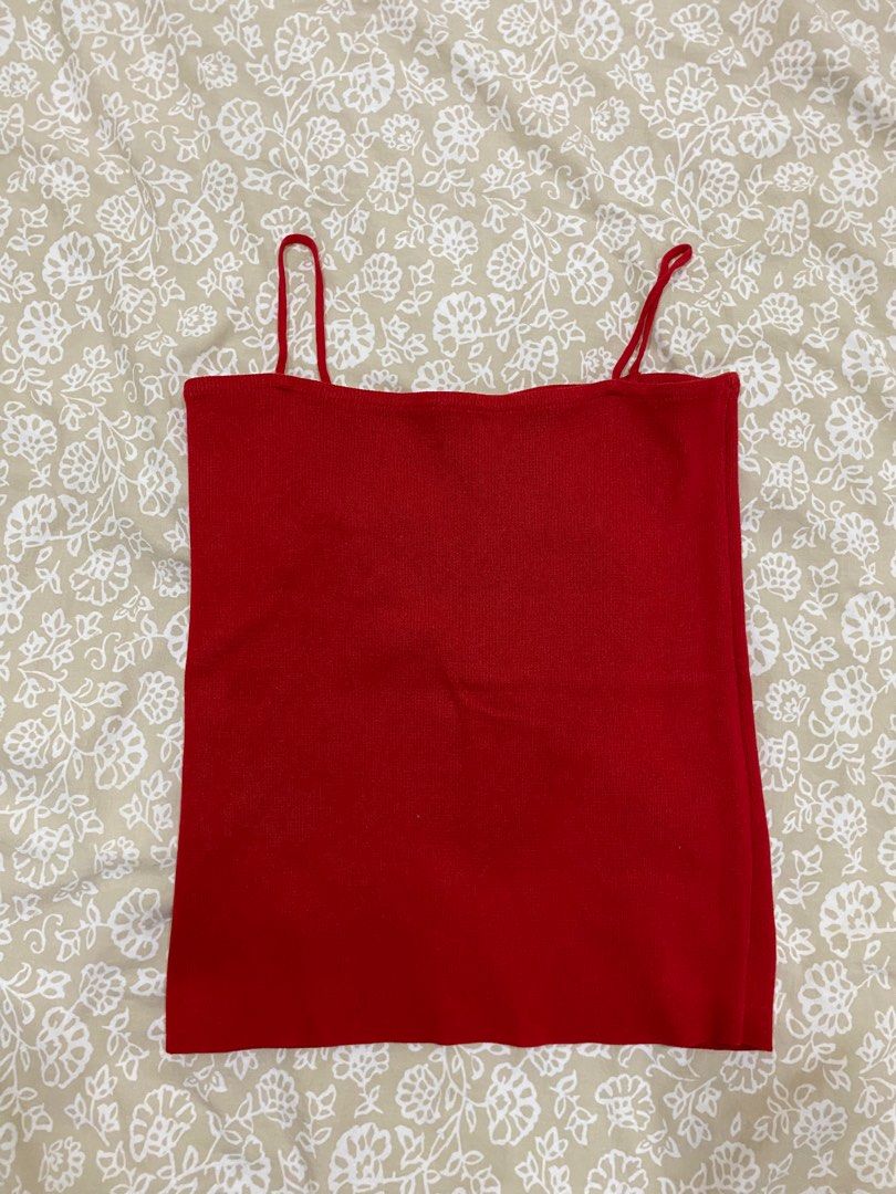 Red knit top (Category: Sleeveless) located in Pasig City. Submitted by declutter890 (Listing ID 1311369233, Image 1). Description: .
