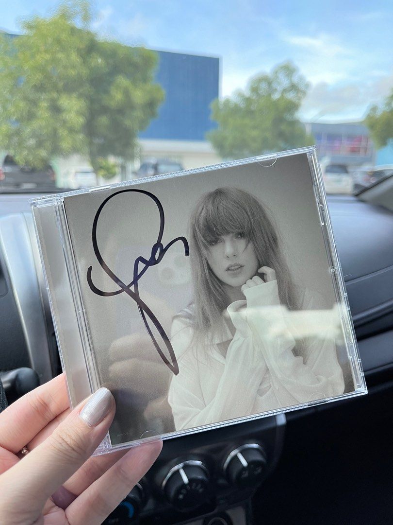 Signed TTPD by Taylor Swift (Category: Western Merchandise) located in Quezon City. Submitted by merch2go (Listing ID 1311405908, Image 1). Description: - bought from a reseller hence the price - selling at the same price i bought it for - no cracks/scratches, in perfect condition - price is fixed - these are the actual photos - onhand & ready to ship.