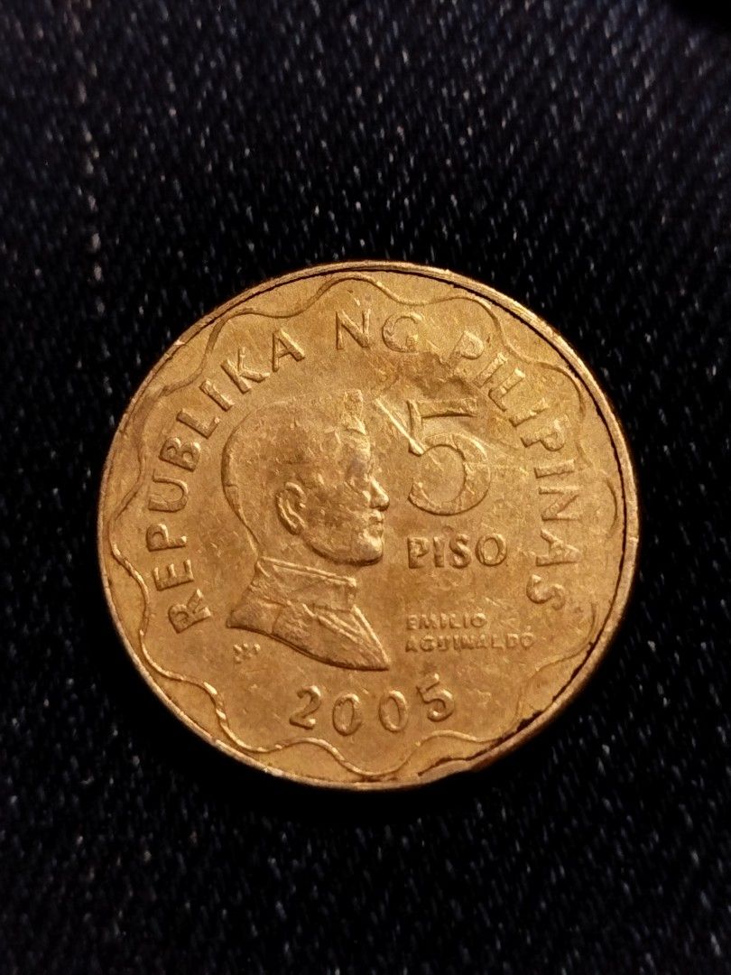 2005 5 piso BSP coin double strike reverse (Category: Currency) located in Subic. Submitted by regiedaniel01 (Listing ID 1306841396, Image 1). Description: add sf.