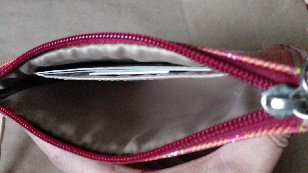 Authentic Coach Small Wristlet (Category: Luxury Bags & Wallets) located in Pasig City. Submitted by onnahvale20617 (Listing ID 1306884128, Image 2). Description: -pre-loved chich Coach wristlet to wear on your wrist or clip it inside a larger Coach bag -comes with care card and original Coach product tag -detachable wrist strap -zip-top closure, clean fabric lining -two credit card slots inside, extra slot in front -dimensions: 6" x 4" -Preferre
