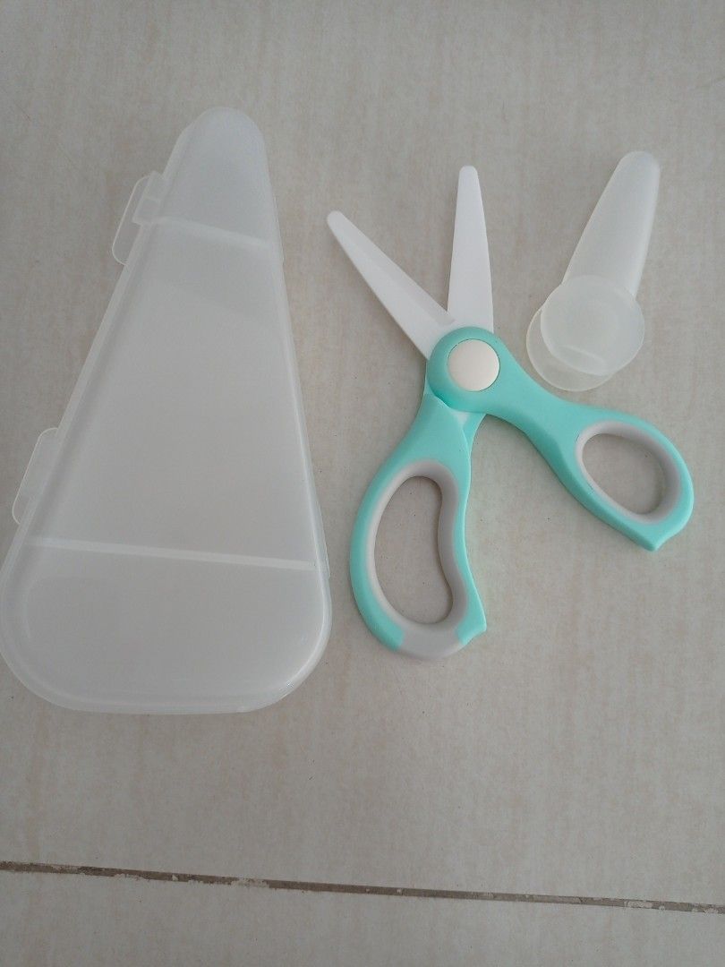 Ceramic scissors (Category: Craft Supplies & Tools) located in Singapore. Submitted by coachforcoach (Listing ID 1306750722, Image 2). Description: Ceramic scissors With cover and frosted storage box Brand new $8 Self collect at Telok Blangah Street 31 (Available).