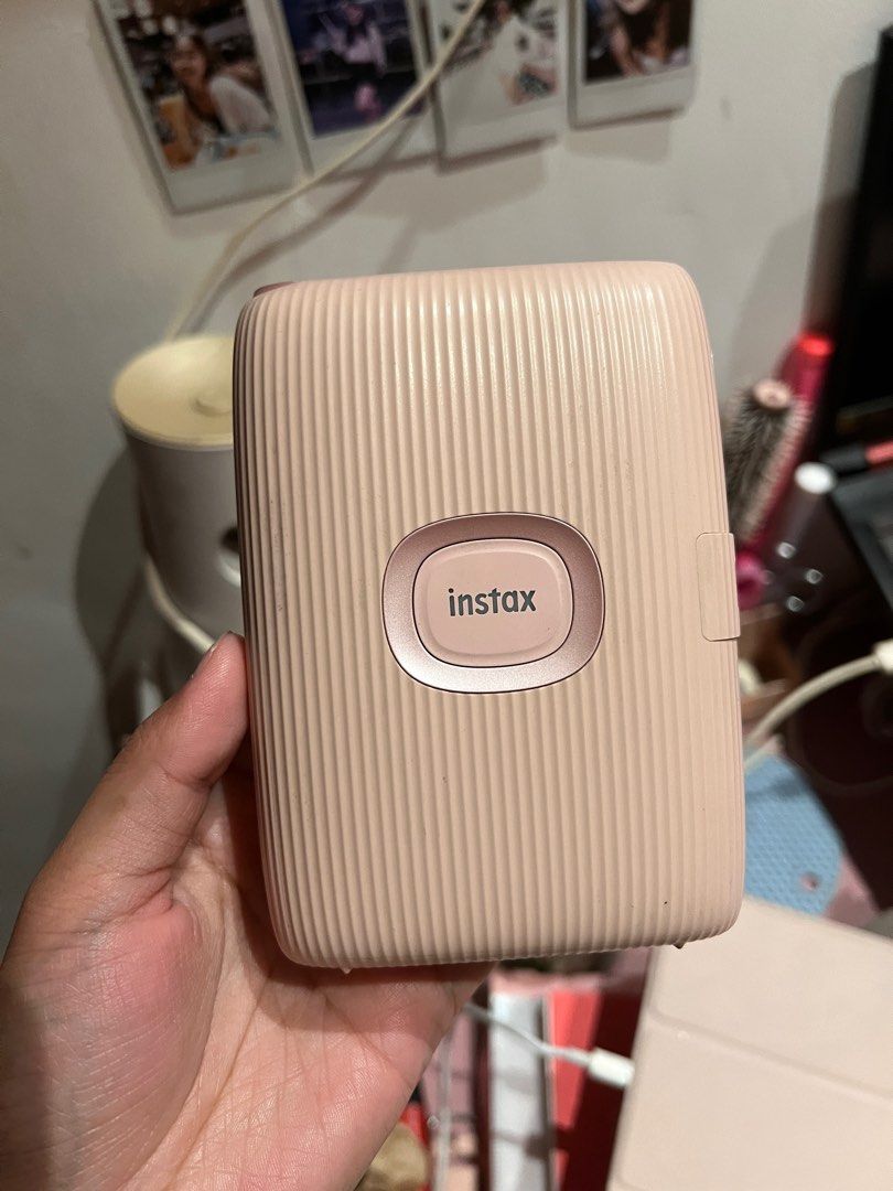 Instax Mini Link 2 (Category: Cameras) located in Quezon City. Submitted by magma2023 (Listing ID 1306846856, Image 2). Description: Last price. No box and charger. Slightly used. Rfs: I enjoy using mini 9. .