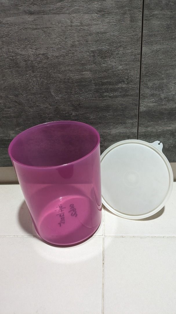 Tupperware (Category: Food Organisation & Storage) located in Singapore. Submitted by chilli_chili (Listing ID 1306833651, Image 3). Description: Various sizes, new, unused big yellow container $4 3 plate shaped containers $3 big pink container $4.
