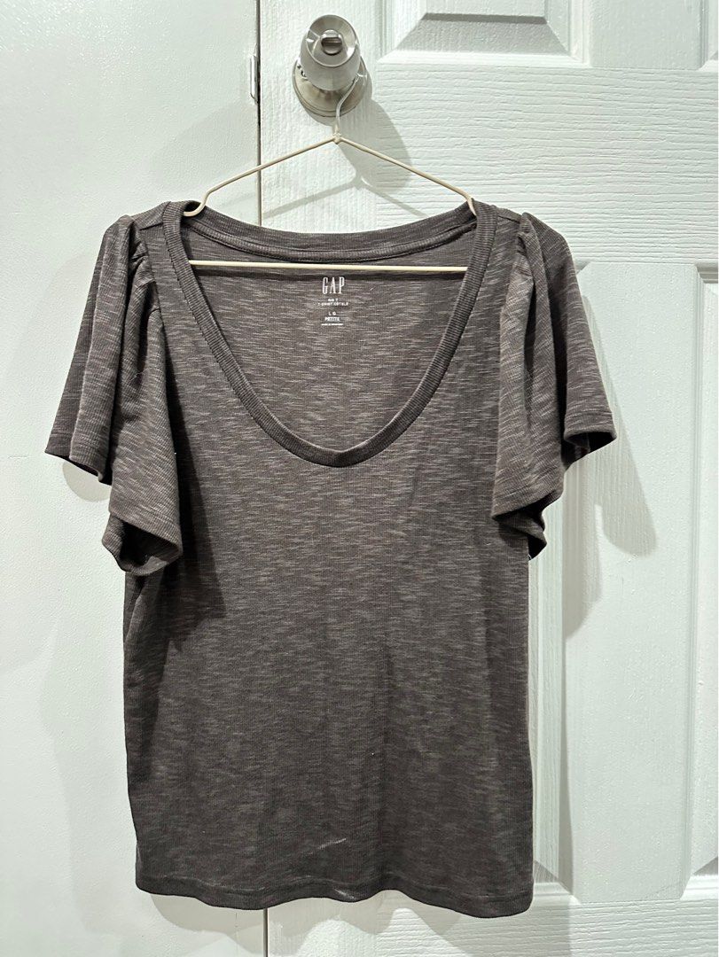 Gap Loose Shirt (Category: Shirts) located in Quezon City. Submitted by erte_ph (Listing ID 1311637619, Image 1). Description: — with slight stain — Actual color may vary due to lighting — Please manage your expectations, these are all pre-loved — No bogus buyer and joy reserver.