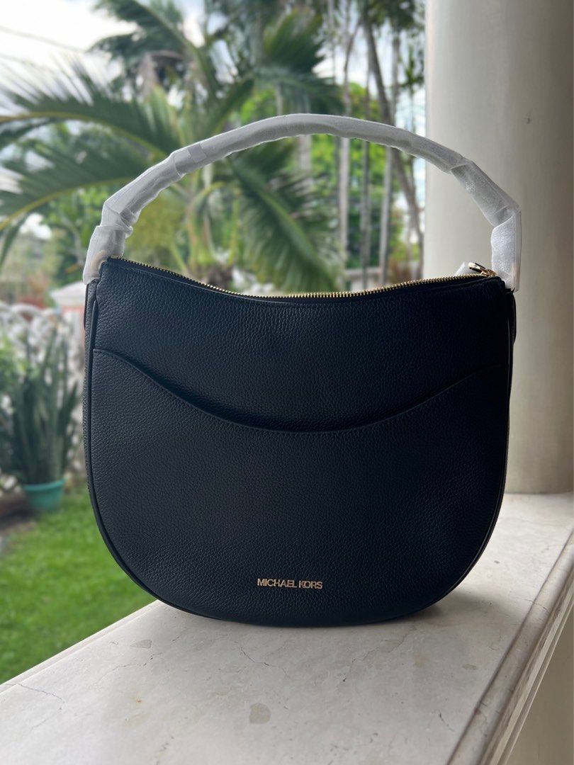 MICHAEL KORS - Dover Leather Shoulder Bag - Large (Category: Shoulder Bags) located in Manila. Submitted by offthenest (Listing ID 1311584618, Image 1). Description: Brand: Michael Kors Model: Dover Leather Shoulder Bag Color: Black Size: Large Original Price: $538.00 Origin: Bought in the US Others: Authentic; With paperbag SIZE: 12.75”W X 11.25” H X 3.25”D PRODUCT DETAILS: Handle drop: 8” Exterior details: front slip pocket Interior details: ba