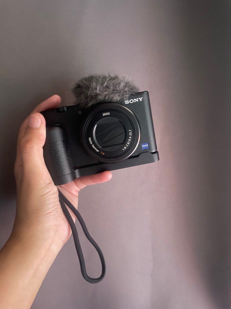 SONY ZV-1 (Category: Cameras) located in Pasay City. Submitted by joycemata (Listing ID 1311593820, Image 1). Description: Complete Set (Box and Receipt Included) With warranty until August Sony Shooting Grip JJC Aluminum Hand Grip Screen Protector Mini LED Video light Purple Sony Bag limited edition with windscreen .