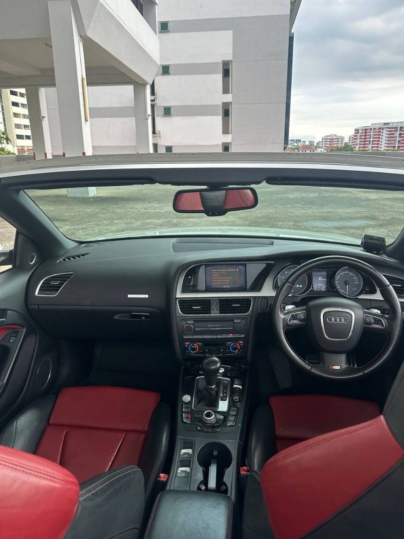 Audi S5 Cabriolet 3.0 TFSI quattro S-tronic (A) (Category: Used Cars) located in Singapore. Submitted by 26motorssg (Listing ID 1306917641, Image 2). Description: 💨 Experience Thrills with the Audi S5 Cabriolet! 💨 🚗 Performance: Powered by a potent engine, the S5 Cabriolet delivers exhilarating performance with every drive. 🌟 Luxury: Indulge in the lap of luxury with premium materials, advanced technology, and exquisite craftsmanship througho