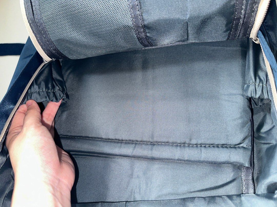 Backpack (Category: Backpacks) located in Singapore. Submitted by bunnytoothx (Listing ID 1306901065, Image 4). Description: Brand new without tag. Comfortably fits 13" laptop. Multiple inner pockets and zips as shown in the photos. Has 2 inner side pockets for umbrella/water bottle. Very functional bag. Selling as underutilised. .