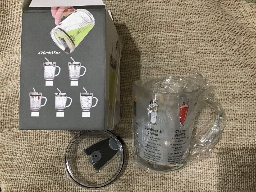 Glass mug with lid and straw (Category: Water Bottles & Tumblers) located in Manila. Submitted by carou35896 (Listing ID 1306925735, Image 1). Description: .