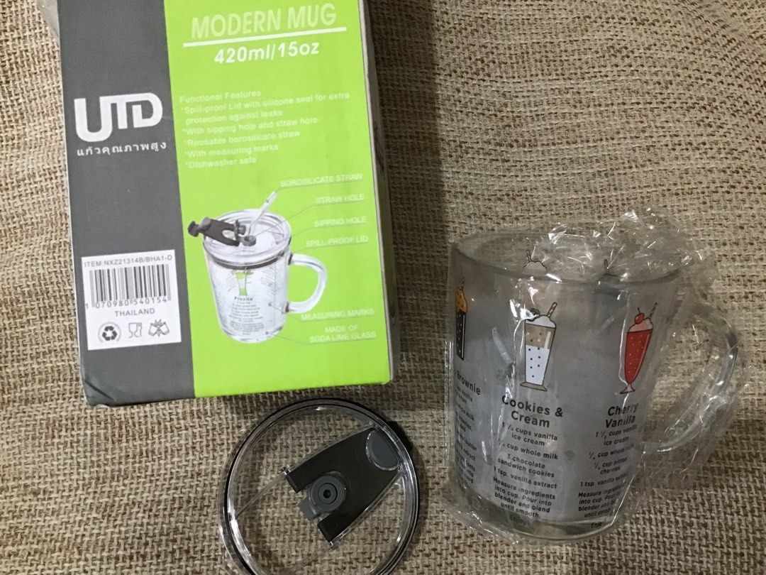 Glass mug with lid and straw (Category: Water Bottles & Tumblers) located in Manila. Submitted by carou35896 (Listing ID 1306925735, Image 3). Description: .