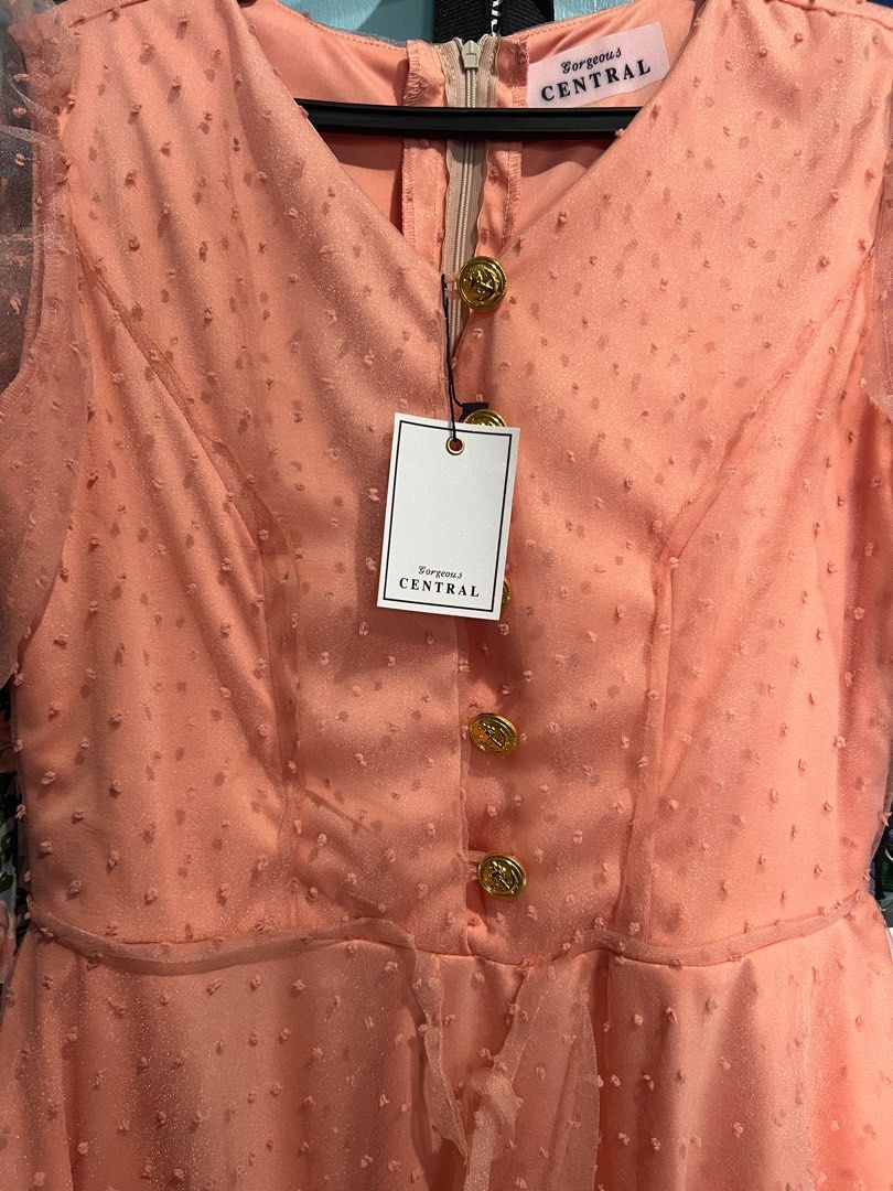 Gorgeous Central Peach Tulle Dress (Category: Dresses) located in Angeles City. Submitted by ashstuff (Listing ID 1306897704, Image 3). Description: Brand of Dress: Gorgeous Central Bust- 36-37” Waist- 30-31” Length- 47” RFS nilabhan sinukat pero di na magkasya hehe Condition: Brand new with tag Ang ganda kaso masikip sa bust ko :( Flaws if there is: none Original Price: 3999 Selling Price: 3300 + shipping Courier: J&T.