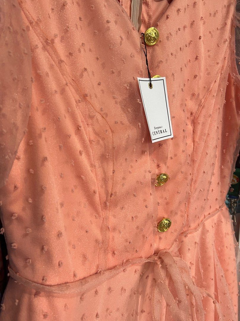 Gorgeous Central Peach Tulle Dress (Category: Dresses) located in Angeles City. Submitted by ashstuff (Listing ID 1306897704, Image 2). Description: Brand of Dress: Gorgeous Central Bust- 36-37” Waist- 30-31” Length- 47” RFS nilabhan sinukat pero di na magkasya hehe Condition: Brand new with tag Ang ganda kaso masikip sa bust ko :( Flaws if there is: none Original Price: 3999 Selling Price: 3300 + shipping Courier: J&T.