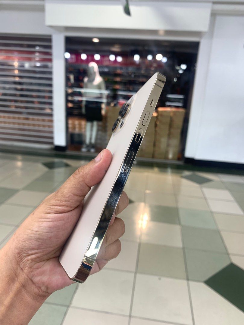 iPhone 13 Pro max 128gb (Category: iPhone 13 Series) located in Manila. Submitted by arzillah (Listing ID 1306926379, Image 2). Description: iPhone 13 Pro max 128gb Factory unlock US variant 97% battery health Slightly use Honest issue: replace LCD and camera No dents No scratches All working Open for COD/COP + SF Manila area (sameday delivery) Provinces area (via LBC) required DP to avoid cancellations Physical store: Greenhills Shopping Center,