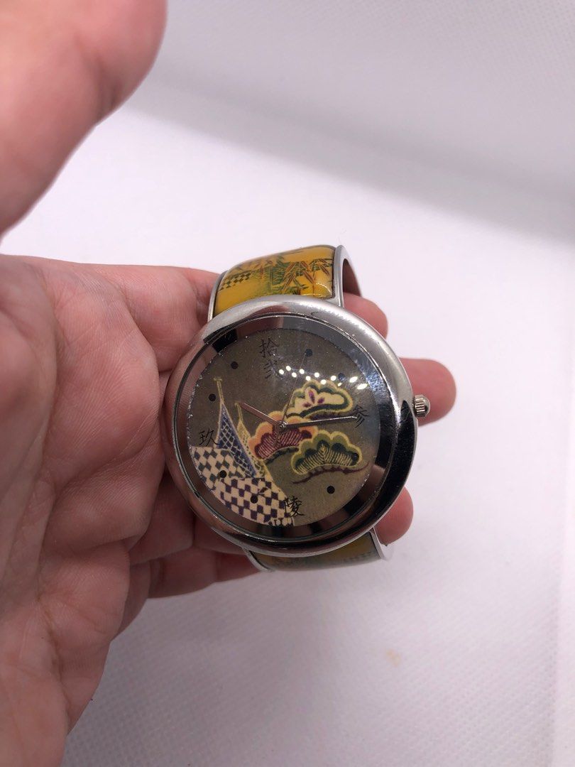 Japan ES watch bangle for ladies (Category: Women's Watches) located in Pasig City. Submitted by lailahbeauty (Listing ID 1307047374, Image 1). Description: For sale onhand Japan bangle watch ES stamp. It has a new battery and in good condition. Flexible yong arm. Big face and has Japan design/arts whole watch. .