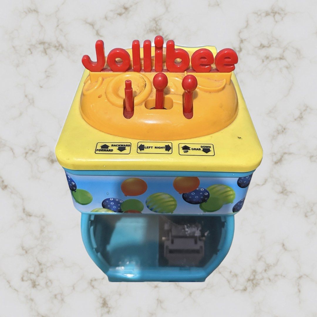 Jollibee Toy Claw Machine (Category: Interactive Toys) located in Manila. Submitted by sytakayama (Listing ID 1306977093, Image 2). Description: Jollibee Claw Machine Not sure if working needs battery Needs cleaning issue: last pic 11 inches.