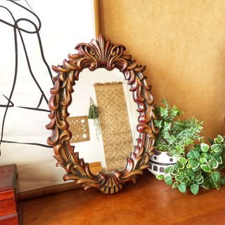 Vintage small carved wood oval wall hanging mirror