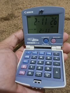 Canon CC-25 pocket calculator with clock alarm function
