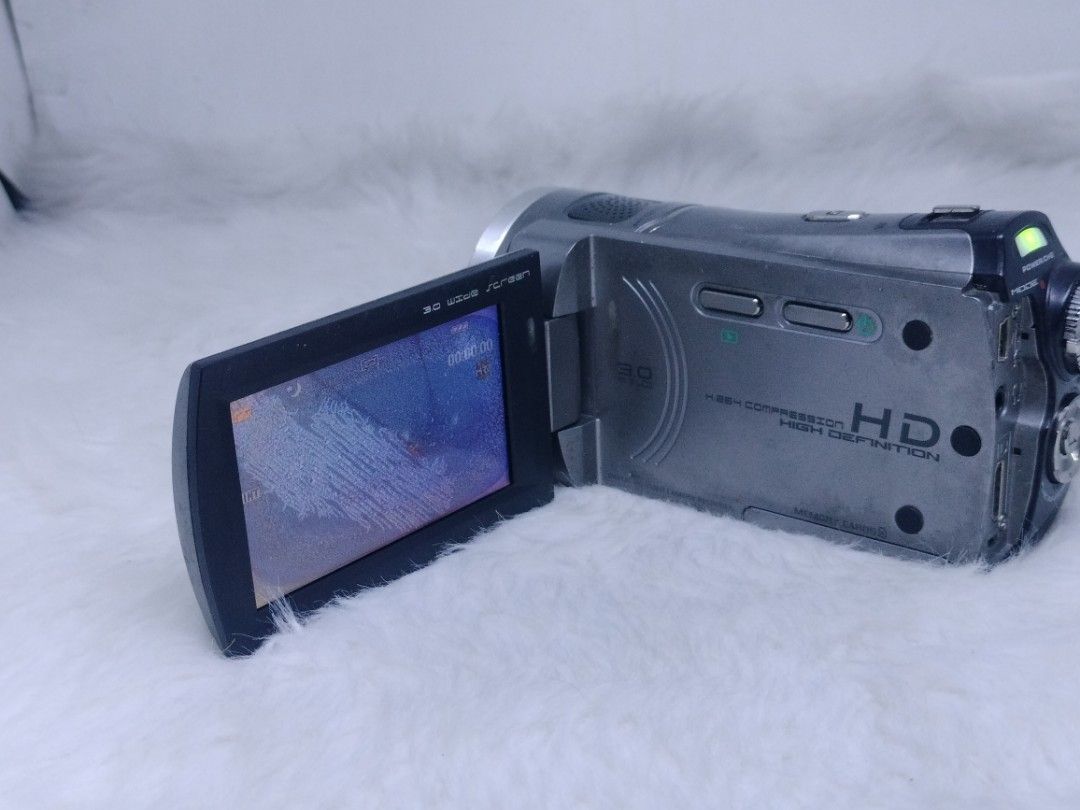 genx g600 hd video camcorder (Category: Video Cameras) located in Manila. Submitted by ultimogizmos (Listing ID 1307185413, Image 2). Description: genx g600 hd video camcorder execellent working condition issue slight burn lcd wont affect performance output dual sd card slot unit battery usb charging cable last price.