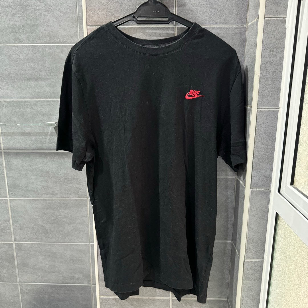black nike t shirt with red tick