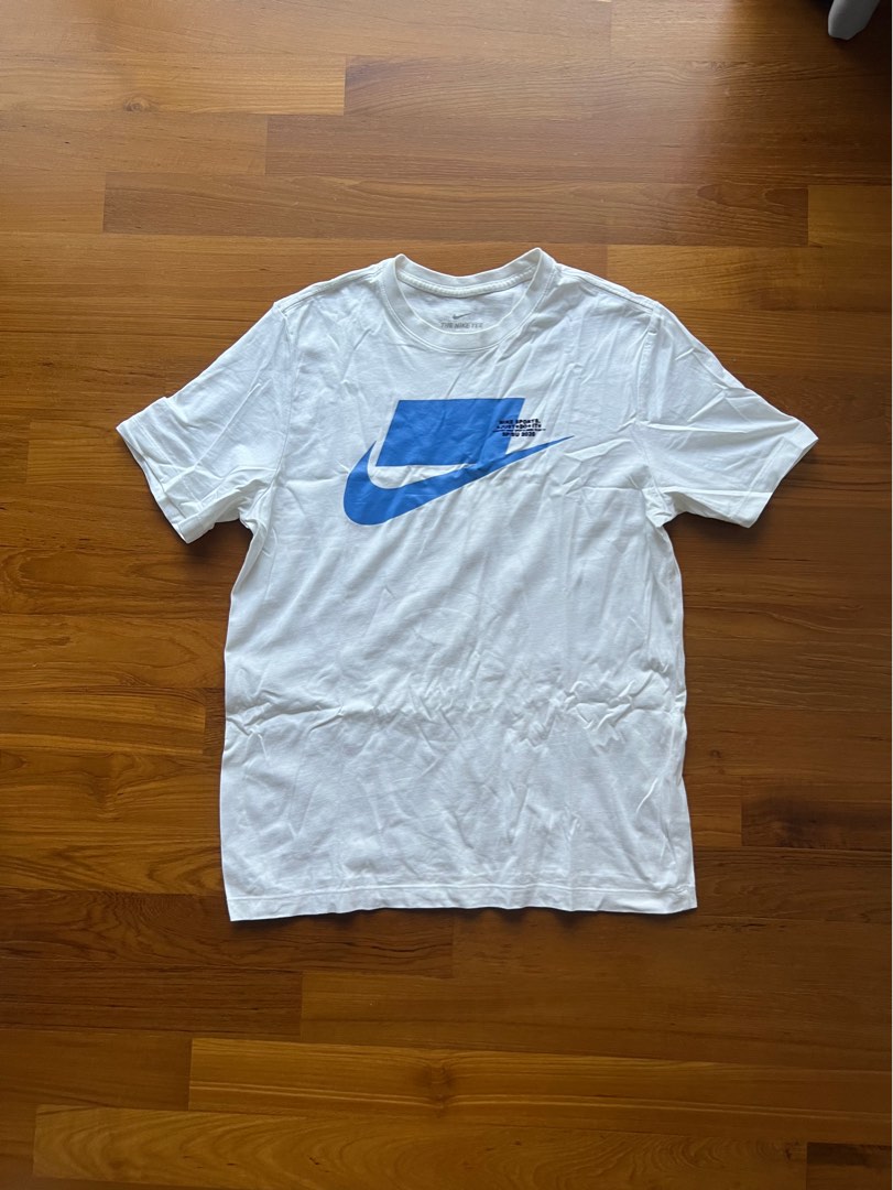 White nike shirt with blue logo new arrivals