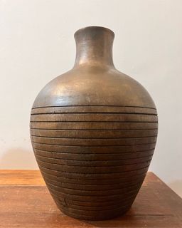 Old wooden vase