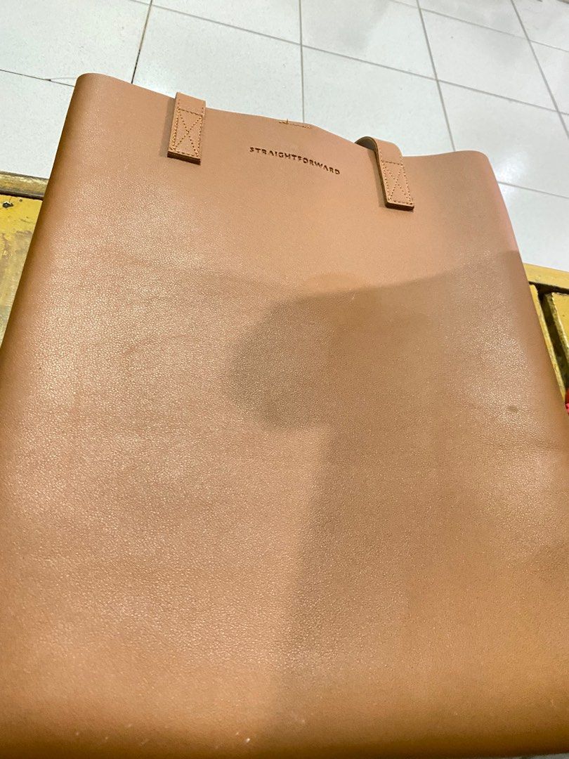 STRAIGHTFORWARD DVL Portrait TAN Tote Bag (Pebble Texture) (Category: Laptop Bags & Sleeves) located in Quezon City. Submitted by ms.bsp (Listing ID 1307068017, Image 3). Description: TOTE BAG 📌 Used only for a month. ₱ 600 Rfs: seryosong decluttering. Willing to let them go 🍀.