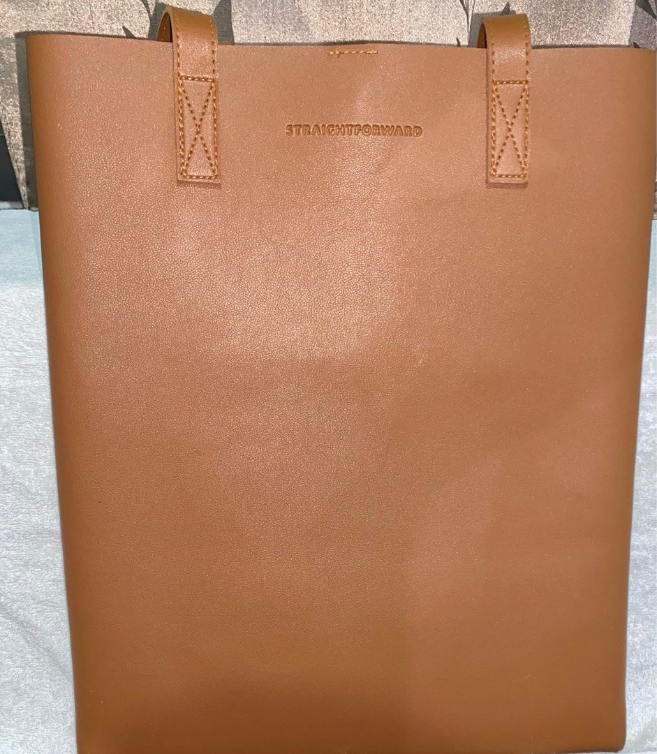 STRAIGHTFORWARD DVL Portrait TAN Tote Bag (Pebble Texture) (Category: Laptop Bags & Sleeves) located in Quezon City. Submitted by ms.bsp (Listing ID 1307068017, Image 1). Description: TOTE BAG 📌 Used only for a month. ₱ 600 Rfs: seryosong decluttering. Willing to let them go 🍀.