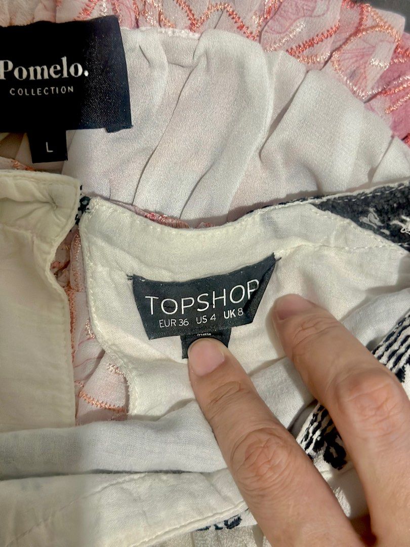 topshop and pomelo (Category: Blouses) located in Consolacion. Submitted by thebundlequeen (Listing ID 1307094527, Image 2). Description: -not used anymore -used once or twice -fits med to large -what you see is what you get white top from topshop. pink top from pomelo..