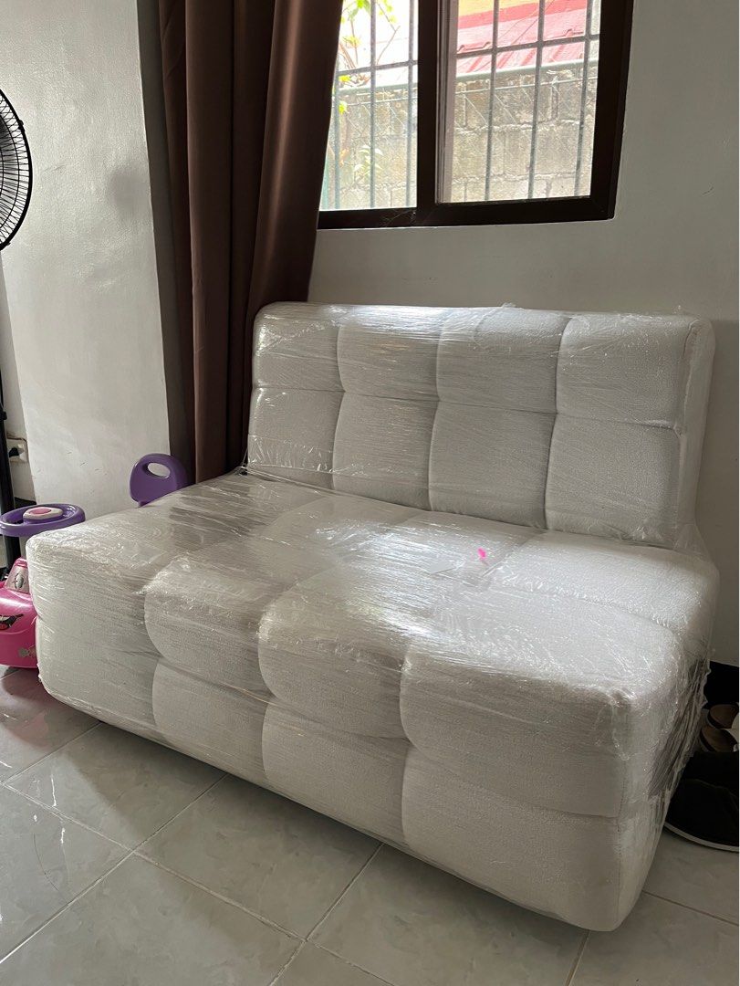 White 2 Seater Minimalist Dimpled Sofa customize (Category: Sofas) located in Las Pinas. Submitted by abby_e_g (Listing ID 1307112383, Image 1). Description: L40 W26 H30 inches Belfort White Fabric.