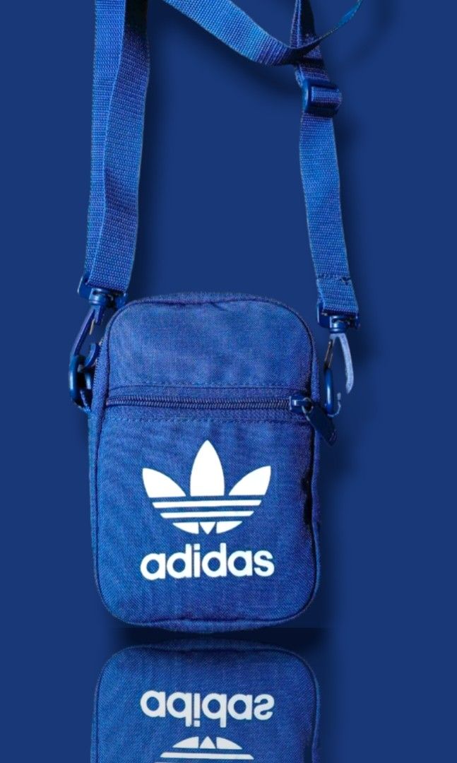 Adidas sling beg.like new