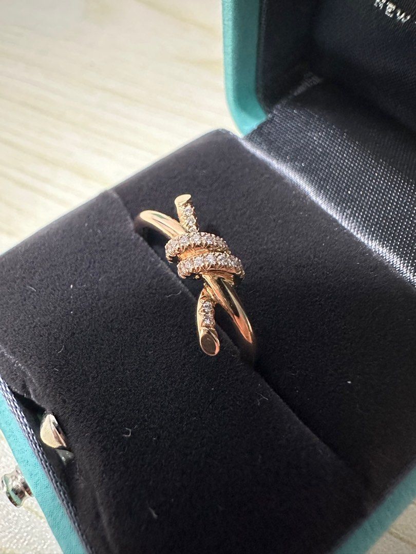 Authentic Tiffany Knot ring with diamonds in rose gold (Category: Body Jewelry) located in Marikina City. Submitted by evantaught (Listing ID 1307250882, Image 3). Description: Authentic Tiffany Knot ring with diamonds in rose gold 18k rose gold .09 carat diamond Size 6 Brand new, never used Comes with box RFS: Helping a friend to sell these to pay for her mother’s medical expenses Authentic item! Price is NEGOTIABLE! PM me your offers 😊.