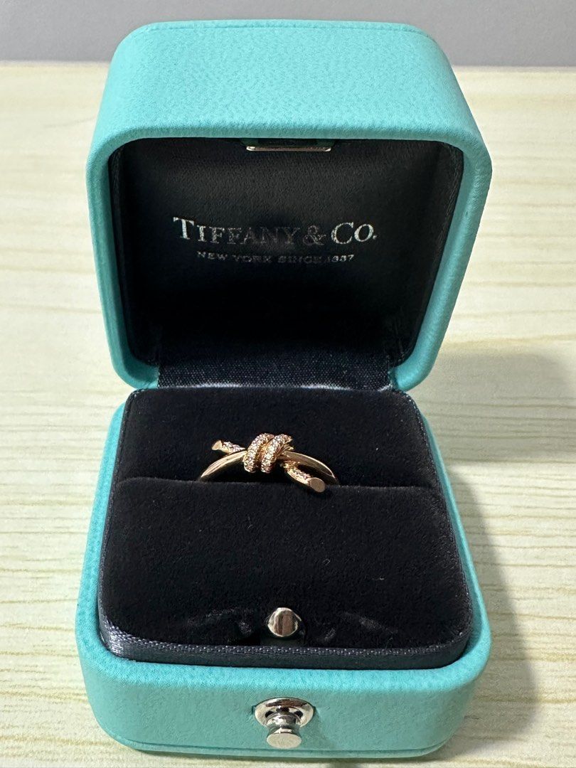 Authentic Tiffany Knot ring with diamonds in rose gold (Category: Body Jewelry) located in Marikina City. Submitted by evantaught (Listing ID 1307250882, Image 2). Description: Authentic Tiffany Knot ring with diamonds in rose gold 18k rose gold .09 carat diamond Size 6 Brand new, never used Comes with box RFS: Helping a friend to sell these to pay for her mother’s medical expenses Authentic item! Price is NEGOTIABLE! PM me your offers 😊.