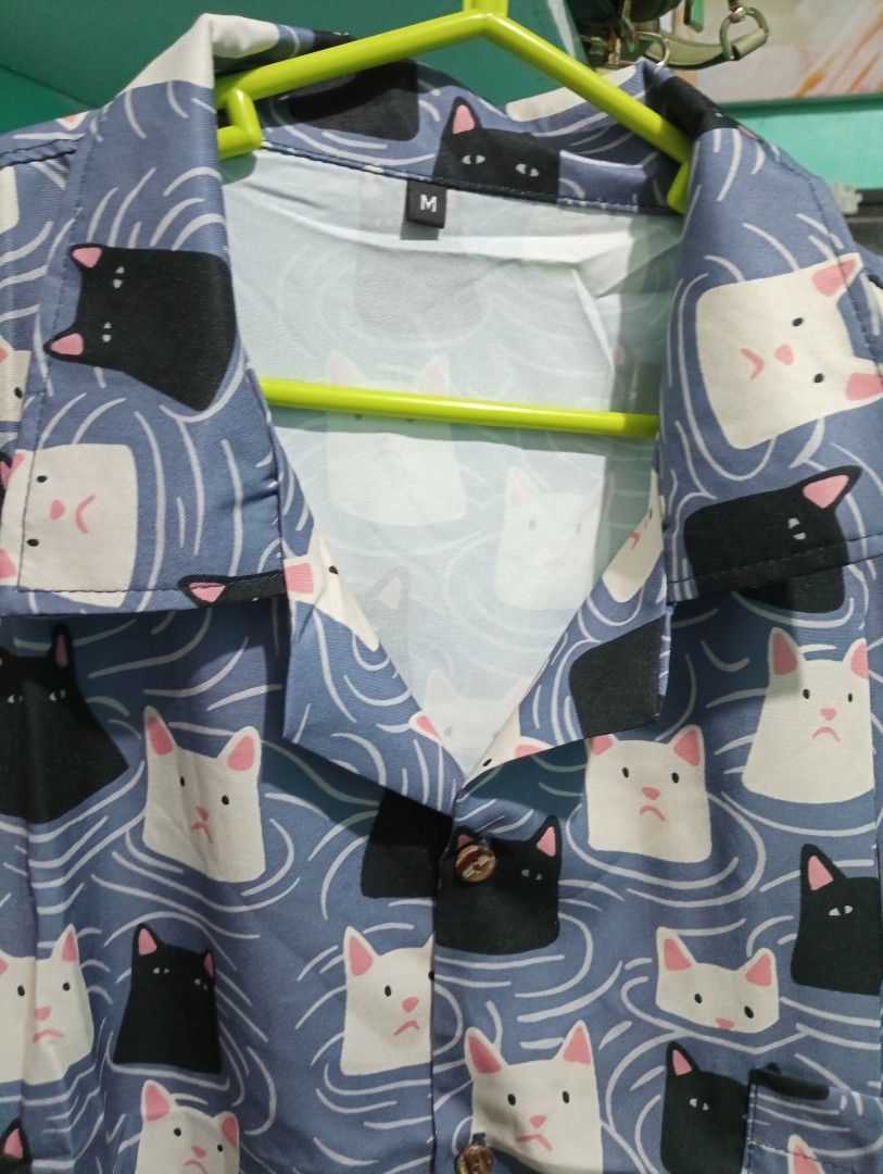 Bkk polo women cat (Category: Others Tops) located in Quezon City. Submitted by hailey_24 (Listing ID 1307338297, Image 2). Description: brand new bkk polo top cat design cute 21 inch width.