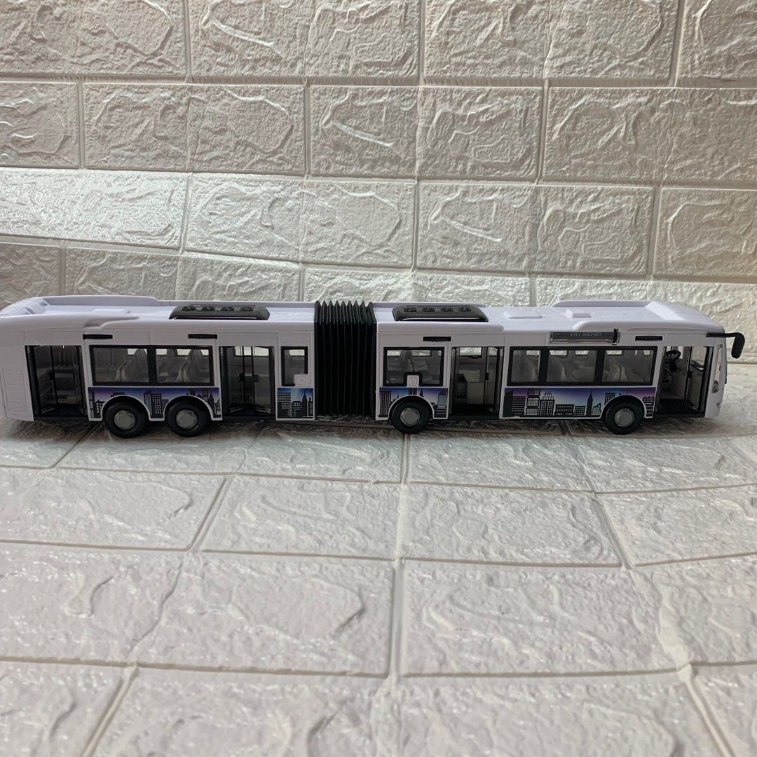 Bus Toy Imported (Category: Vehicle & Diecast Models) located in Manila. Submitted by thekidshop (Listing ID 1307352924, Image 1). Description: Long bus Doors can open Germany Toy Brand Orig Orice 1,400.