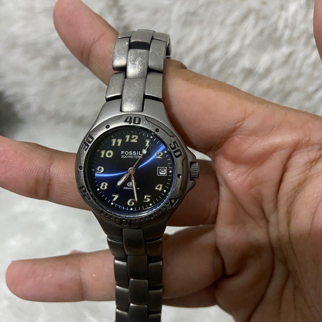 Fossil blue titanium watch price best sale