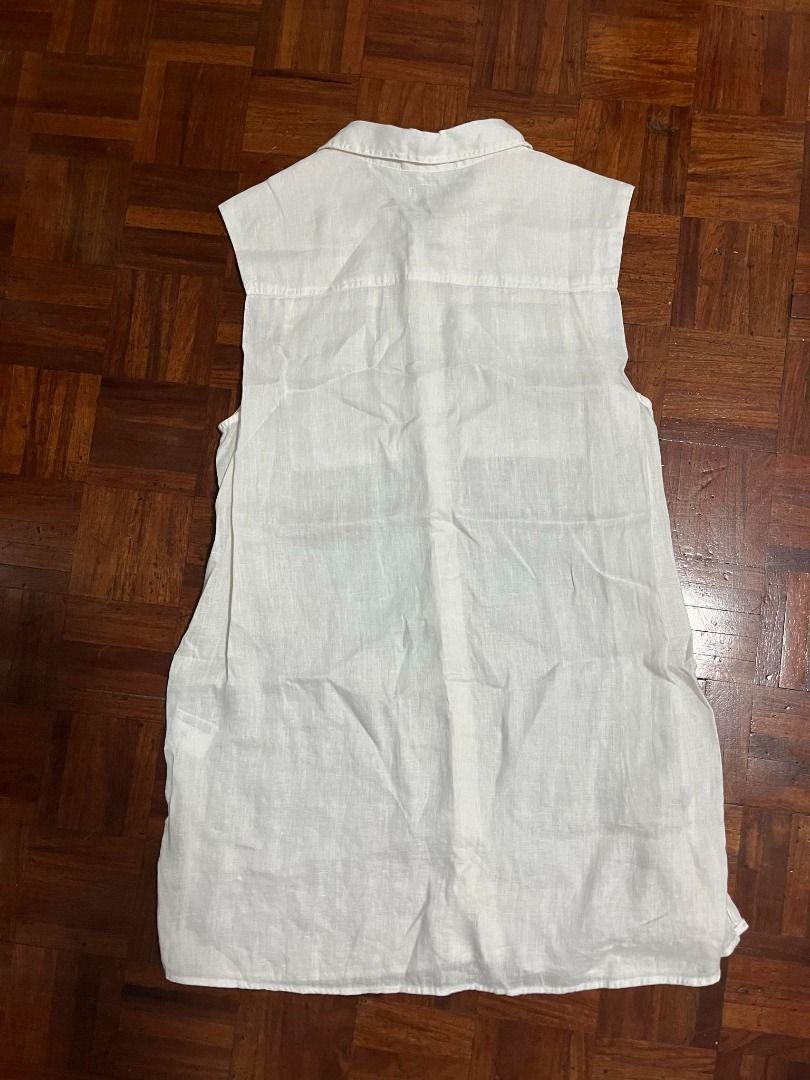 H&M white long top (Category: Others Tops) located in Quezon City. Submitted by official.lostcorner (Listing ID 1307382511, Image 2). Description: Original H&M. No issues. Looks good as new..