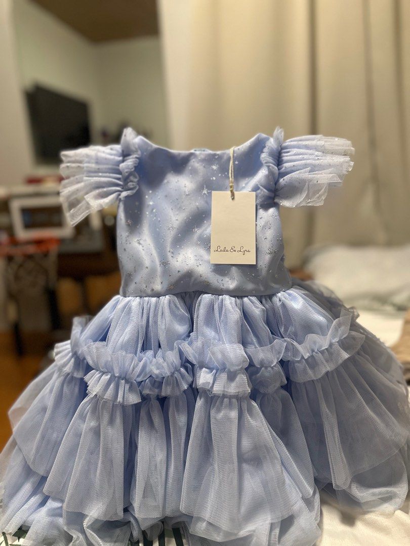 Laila & Lyra Blue Gown (Category: Babies & Kids Fashion) located in Quezon City. Submitted by chaarmed (Listing ID 1307321933, Image 1). Description: For 2yo USED ONCE FOR 2hrs!!! Original price 2850.
