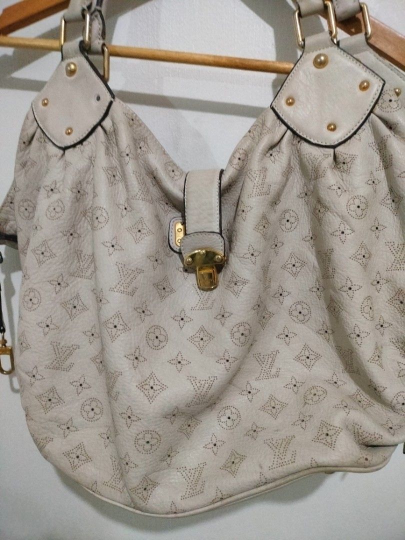 Louis Vuitton Mahina L Bag (Category: Luxury Bags & Wallets) located in Calamba. Submitted by sinauna. (Listing ID 1307381819, Image 2). Description: WTS: Louis Vuitton Mahina L Bag Issue/s: no lock, missing code Price: 999+SF PM/DM if interested. Thank you!.