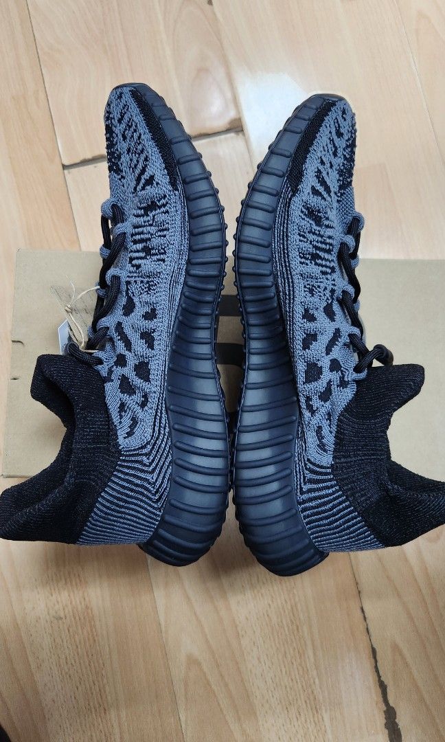 black yeezy with colors