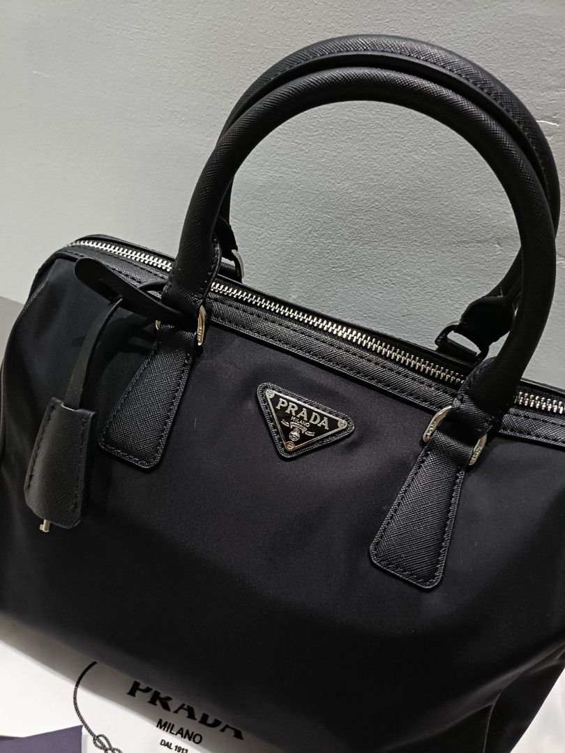 Nylon Boston bag Black (Category: Luxury Bags & Wallets) located in Cebu City. Submitted by erlacoleccion (Listing ID 1307386026, Image 2). Description: Prada Boston Genuine Nylon Canvas coded Lampo Zipper NO FLAWS.