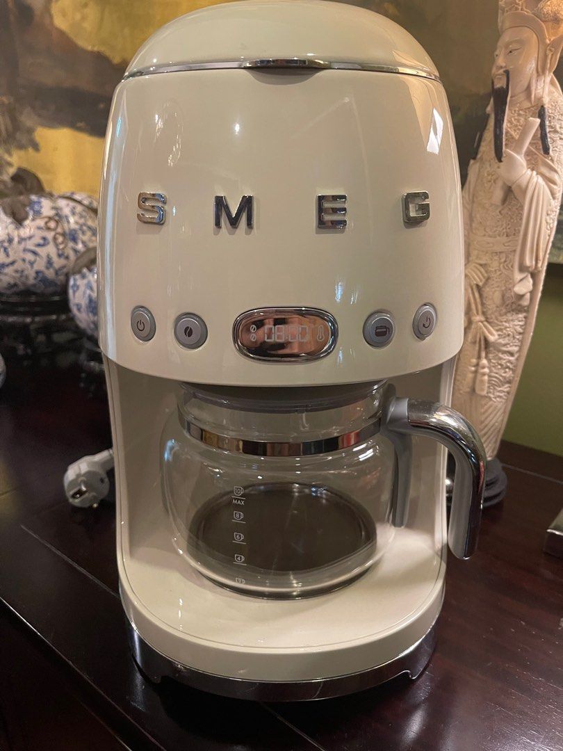 🔥 SMEG Drip Filter Coffee Machine (Cream) (Category: Coffee & Tea Tableware) located in Muntinlupa City. Submitted by pelazzzy (Listing ID 1307333141, Image 1). Description: Comes with a Permanent & Washable Filter, and Coffee Scoop Auto-Startwith Aroma Intensity Function Keep Warm Function keeps your pot of coffee warm for up to 40 minutes after brewing Black and White Coffee Cup 4-Cup Function for a quick brew 10-Cup Capacity and 1.4L water ta