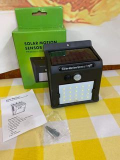Solar motion sensor light