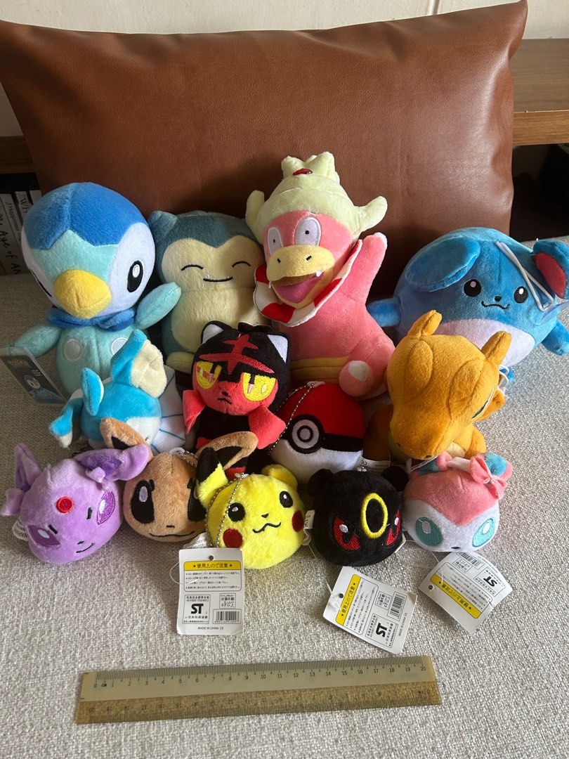 Assorted Pokémon plushies (piplup, snorlax, slowking, Marill