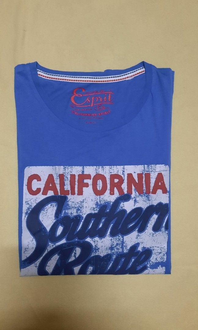 ESPRIT men's t-shirt S/S (Category: Tshirts & Polo Shirts ) located in Lapu Lapu. Submitted by ralphralf (Listing ID 1307551877, Image 3). Description: Brand : ESPRIT men's t-shirt S/S - short sleeves Color: cornflower blue (search this color on google) Printed t-shirt (front only) Size: fits well to medium, small if you want it loose Regular fit Dimes: 21x27 (see photos) Fabric: 100% cotton Very soft Ready to wear, washed and ironed already NO i