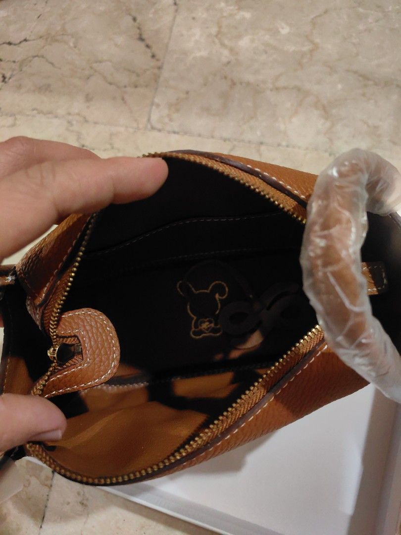 HOLB mini zippy (Category: Cross-body Bags) located in Quezon City. Submitted by finds_stuff (Listing ID 1307523035, Image 2). Description: Color: gold Original Genuine leather.
