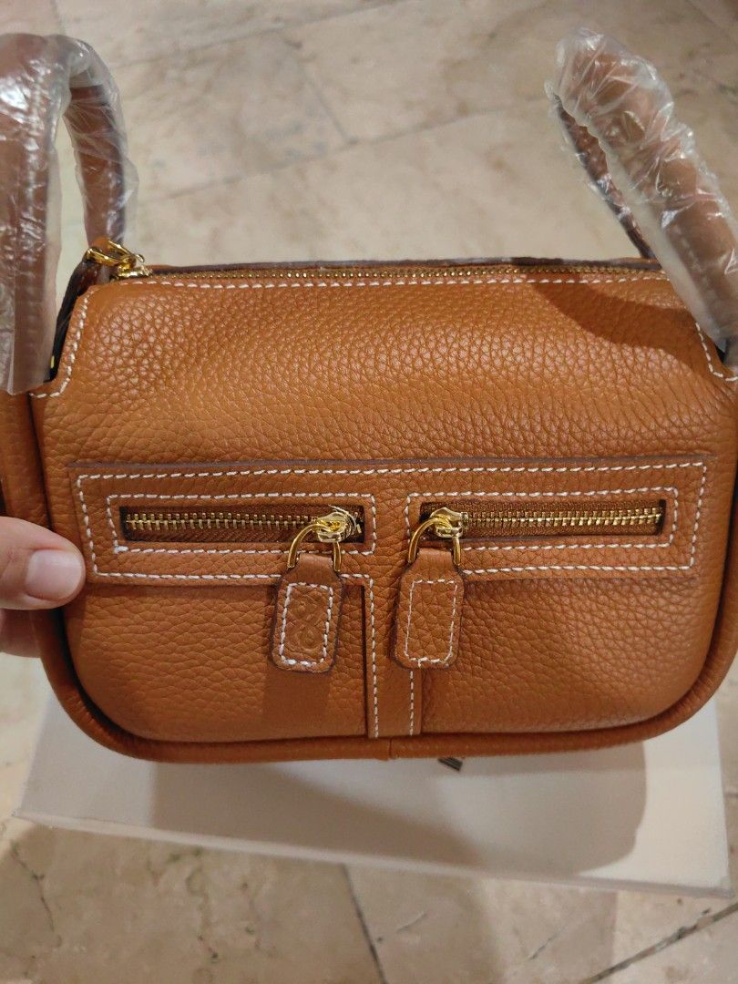 HOLB mini zippy (Category: Cross-body Bags) located in Quezon City. Submitted by finds_stuff (Listing ID 1307523035, Image 1). Description: Color: gold Original Genuine leather.