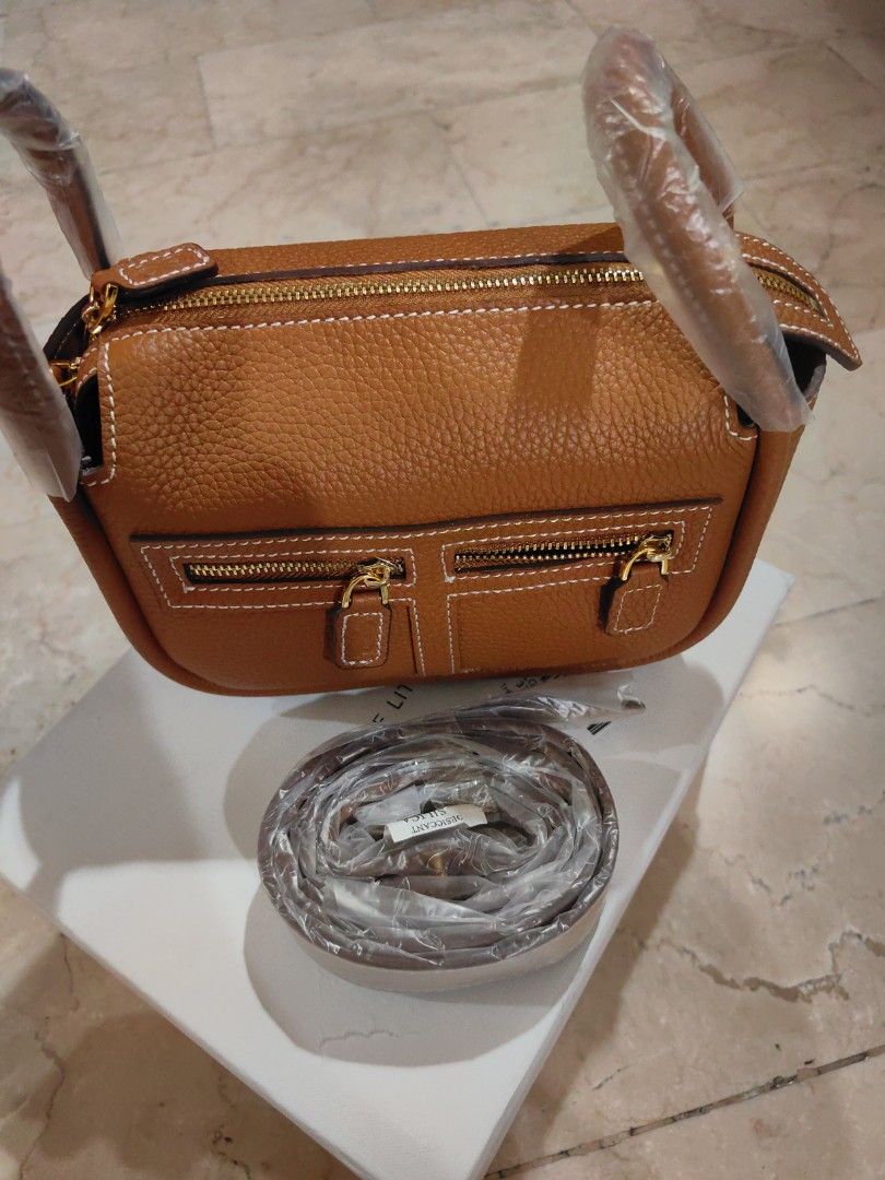 HOLB mini zippy (Category: Cross-body Bags) located in Quezon City. Submitted by finds_stuff (Listing ID 1307523035, Image 3). Description: Color: gold Original Genuine leather.