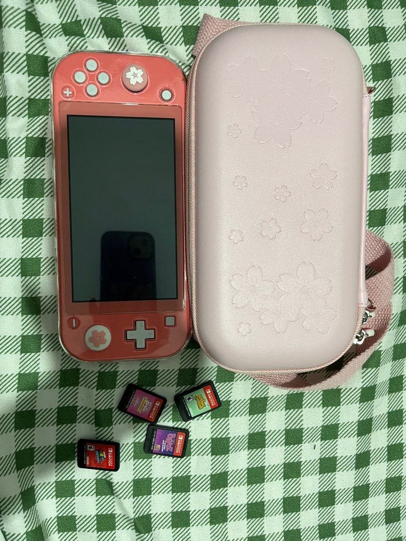 Like New - Nintendo Switch Lite in Coral (Category: Nintendo) located in Quezon City. Submitted by merch2go (Listing ID 1307559666, Image 1). Description: - inclusive of the barbie game + the accessories which are the pouch, glass protector, and tempered glass - other games sold separately: 1k for bratz, 2k mario odyssey, 2k animal crossing (negotiable if get all).