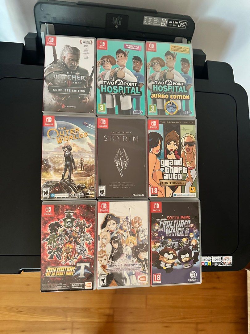 Nintendo Switch game The Witcher Two Point Hospital Two Point